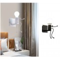 Applique da parete omino seduta bianco nero attacco E27 lampada particolare moderno per camera cameretta bambini