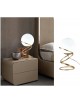 Lampada da tavolo comodino oro con sfera in vetro bianco design moderno lume dorato con cerchi